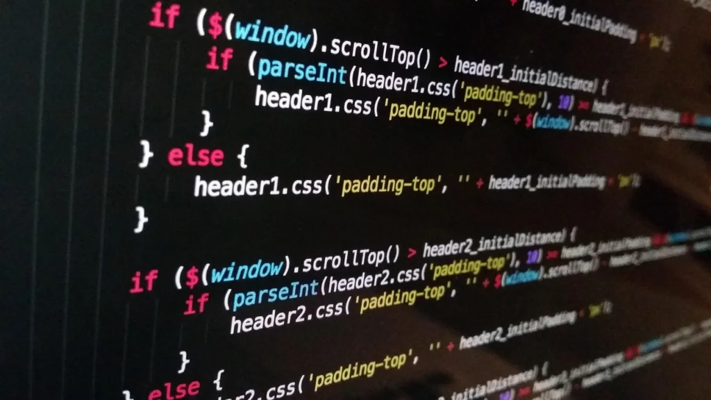 developer working on website code on monitor